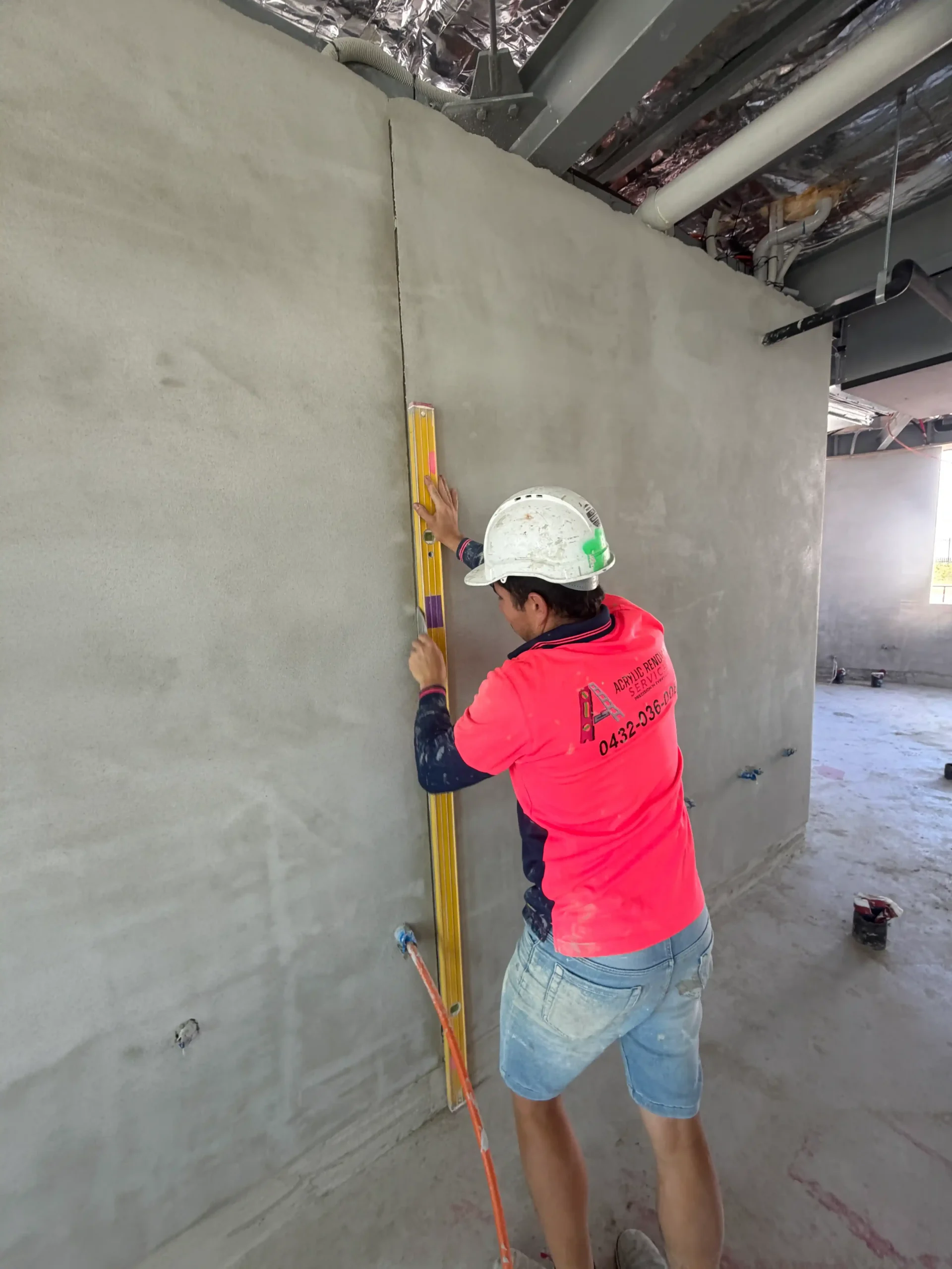Acrylic rendering application on interior wall Sydney project
