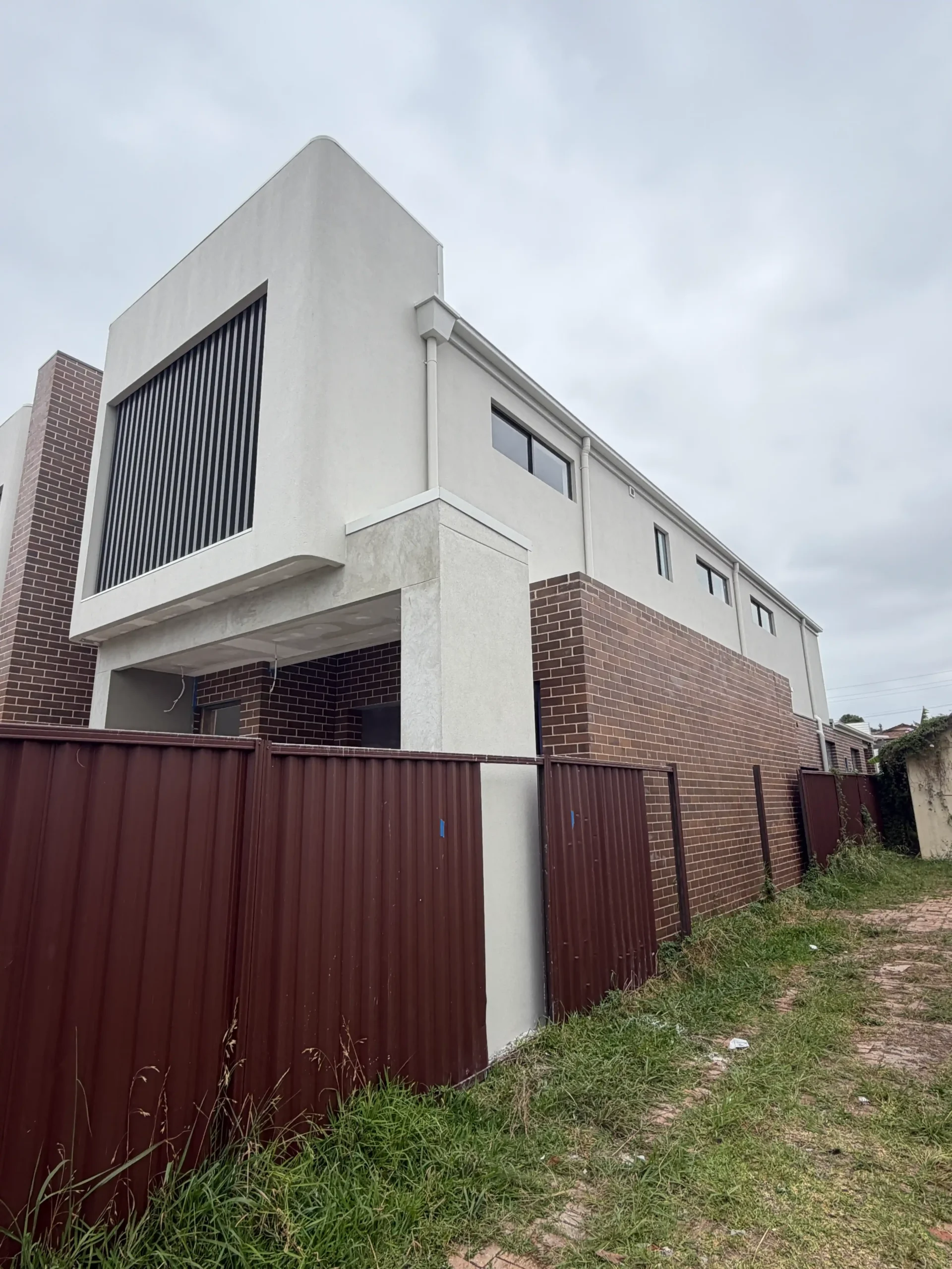 Exterior rendering Sydney side wall project with smooth finish